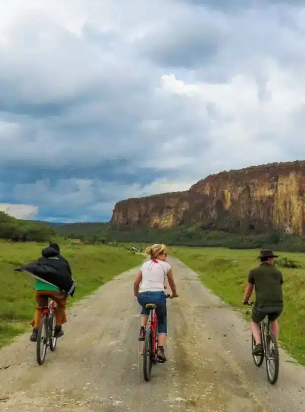 Visitors biking along scenic trails in Hell’s Gate during an 8 Day Kenya Safari itinerary.