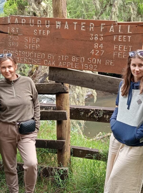 Guests at the Aberdare National Park sign during the 3-Day Ol Pejeta Conservancy and Aberdare National Park Safari