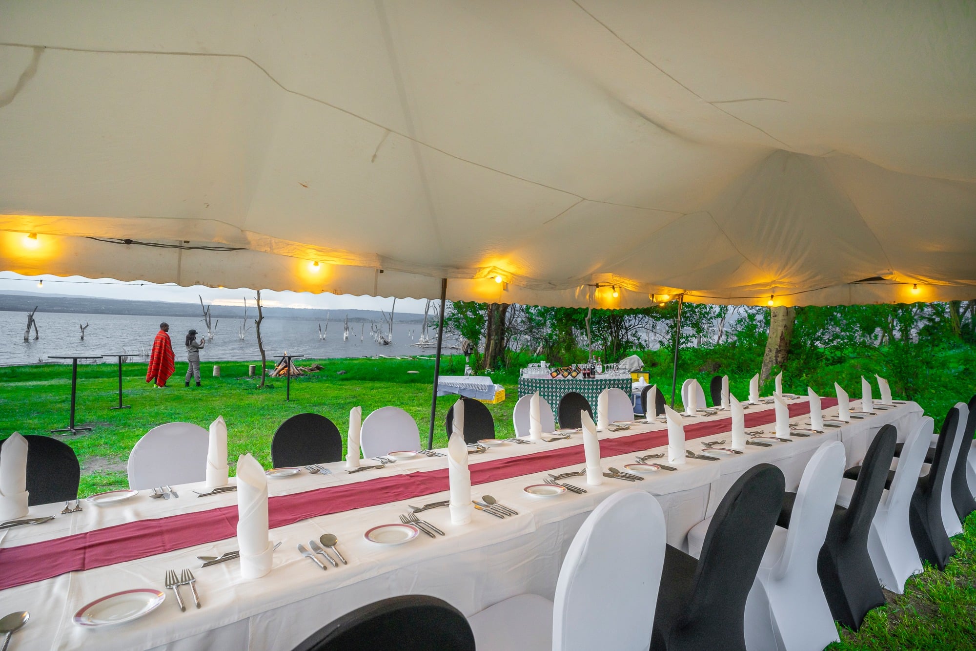 Outdoor dining setup at Sarova Lion Hill Game Lodge overlooking Lake Nakuru during a 3-day safari to Lake Nakuru
