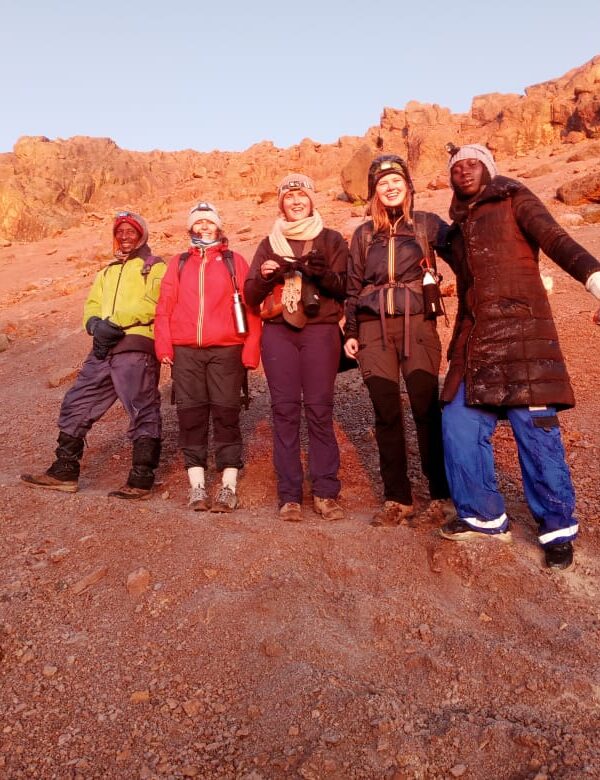 Mount Kenya hiking group on alpine trail during a 4 day guided trek