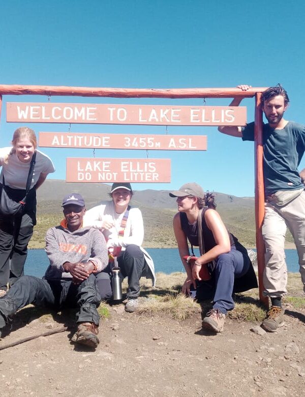 Mount Kenya hiking guides and climbers at Point Lenana summit during a 4 day guided hike