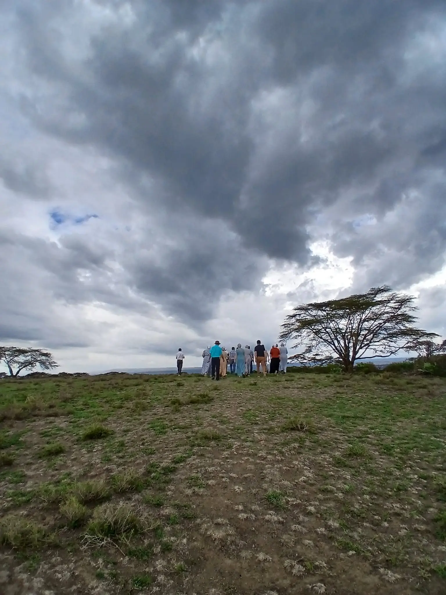 Guests on a guided walking safari across Crescent Island near Lake Naivasha, Kenya