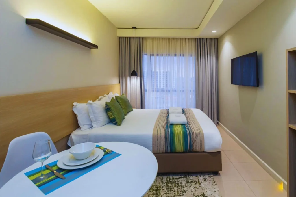 Modern guest room at Kozi Suites in Nairobi