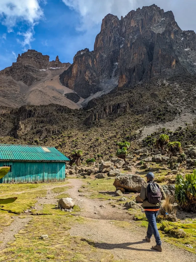 Trekker arriving at Shipton Camp on the Mount Kenya Sirimon Route