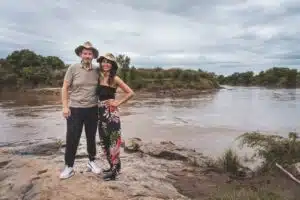 Gemfinders Safaris Guests at riverbank in Masai Mara during Kenya safari