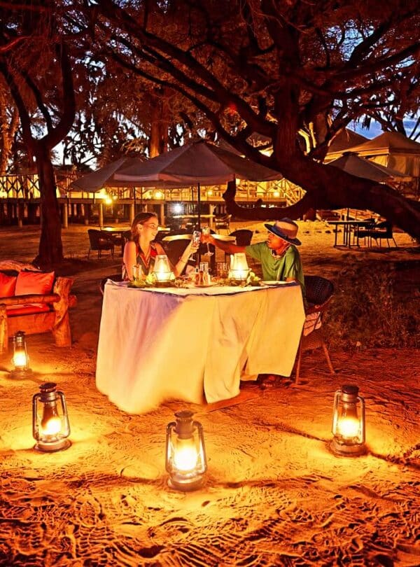 Candlelit outdoor dining setup in Samburu during a private Samburu Masai Mara safari