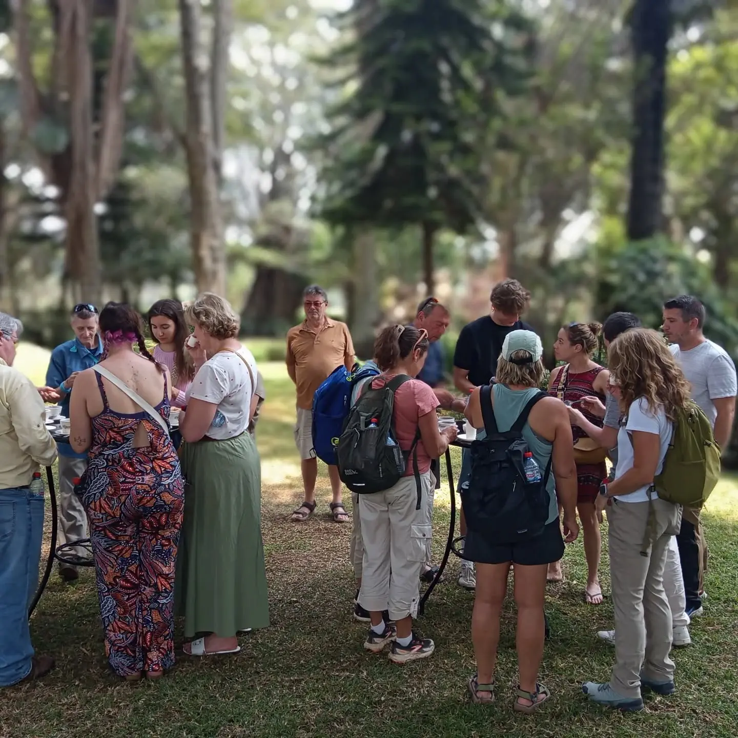 Visitors enjoying a guided coffee tasting at Fairview Coffee Estate
