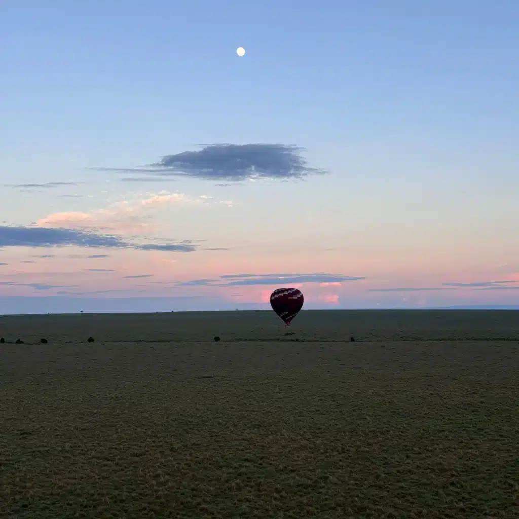 Gemfinders Safaris guests on an early morning hot air balloon ride over the Masai Mara