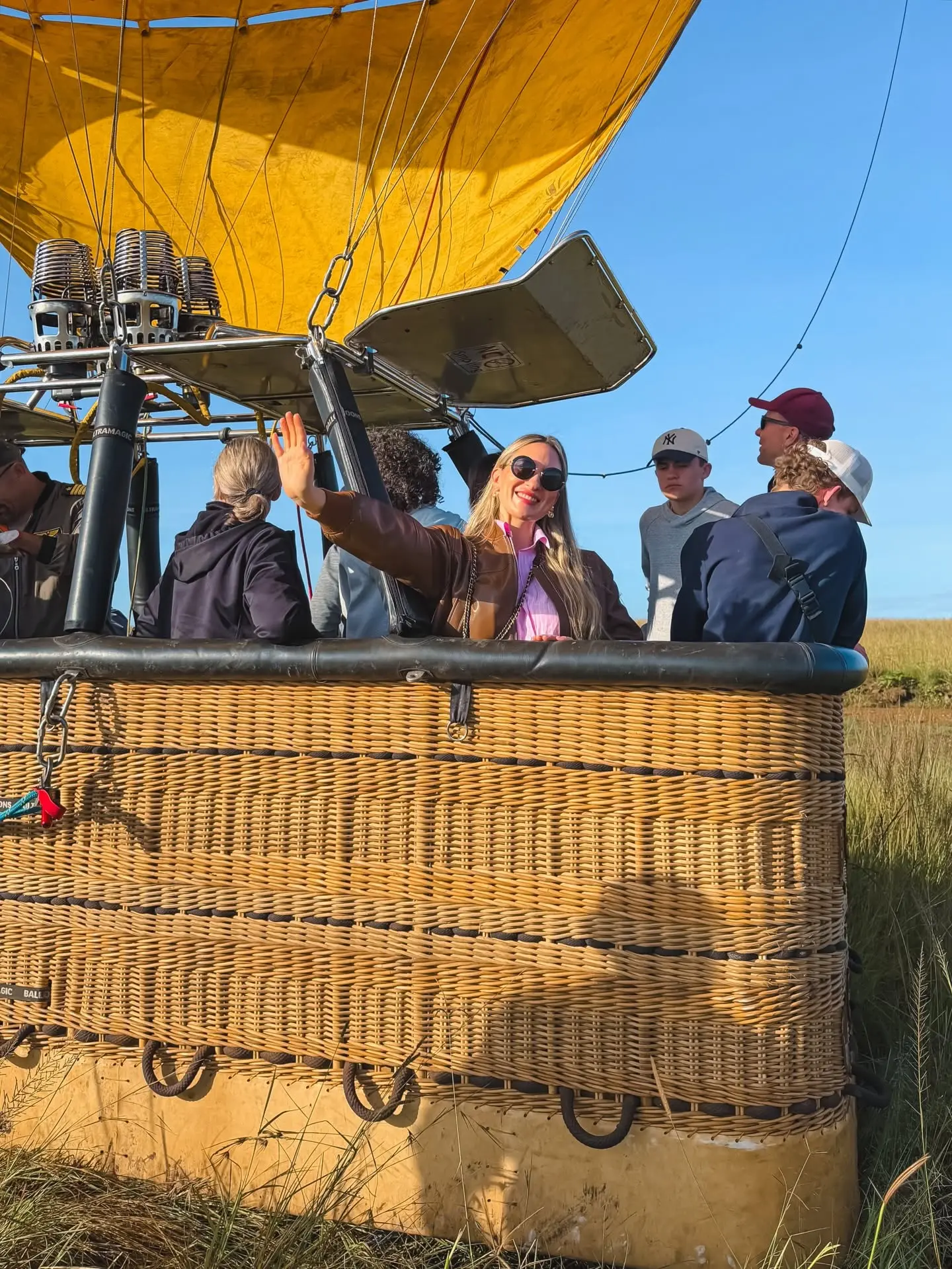 Travellers preparing for a hot-air balloon flight in the Maasai Mara