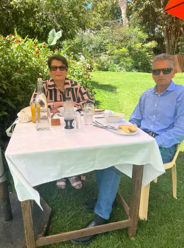 Guests enjoying a relaxed outdoor lunch at Kiambethu Tea Farm in Limuru
