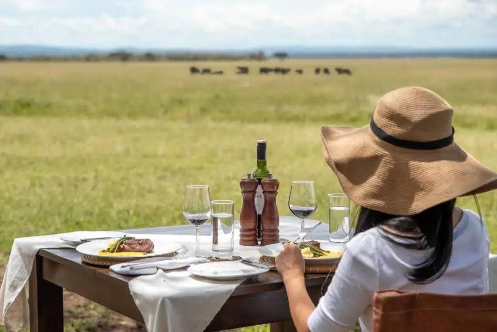 Outdoor bush dining experience on a 7-day Kenya safari, offering excellent value for money