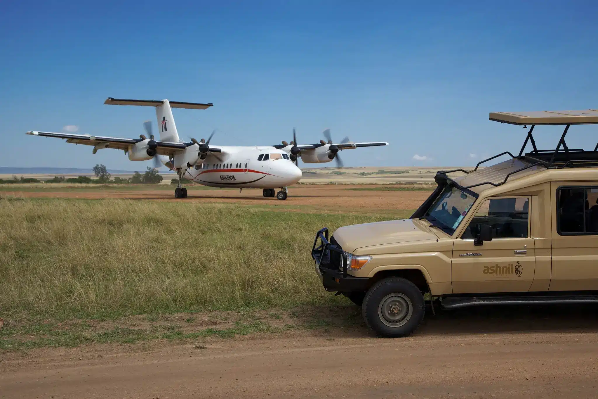 Air Kenya aircraft and lodge vehicle connection on Samburu Fly-In Safari