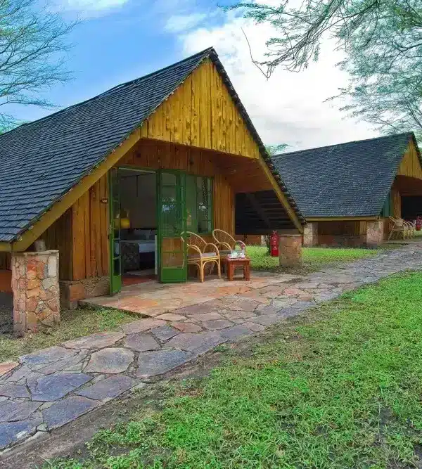 Wooden chalet accommodation with private verandas at Muthu Keekorok in the Masai Mara.