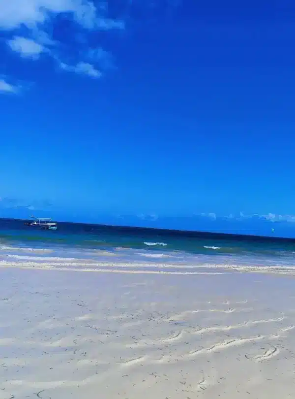 White-sand beach and turquoise water at Diani Beach, Kenya
