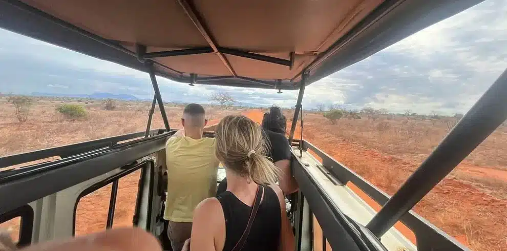 Travellers viewing wildlife from a pop-up roof in Tsavo East National Park