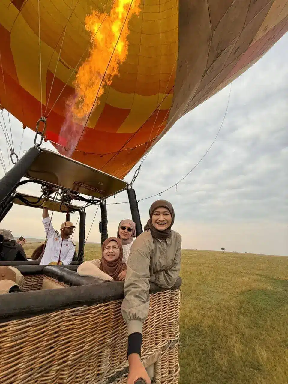 Guests preparing for a hot-air balloon flight over the Masai Mara.
