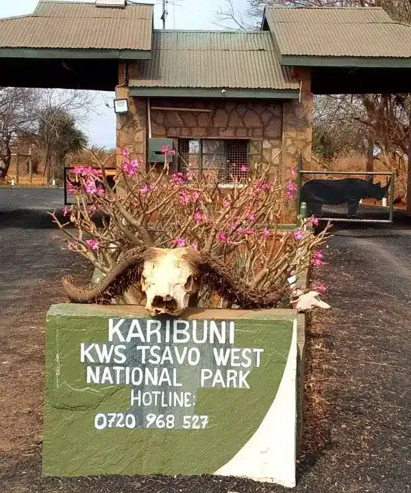 Entrance gate and signage at Tsavo West National Park, Kenya.