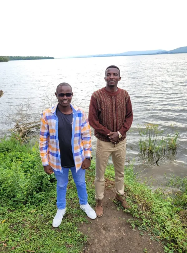 Visitors at Lake Mburo National Park shoreline, Uganda during safari stopover