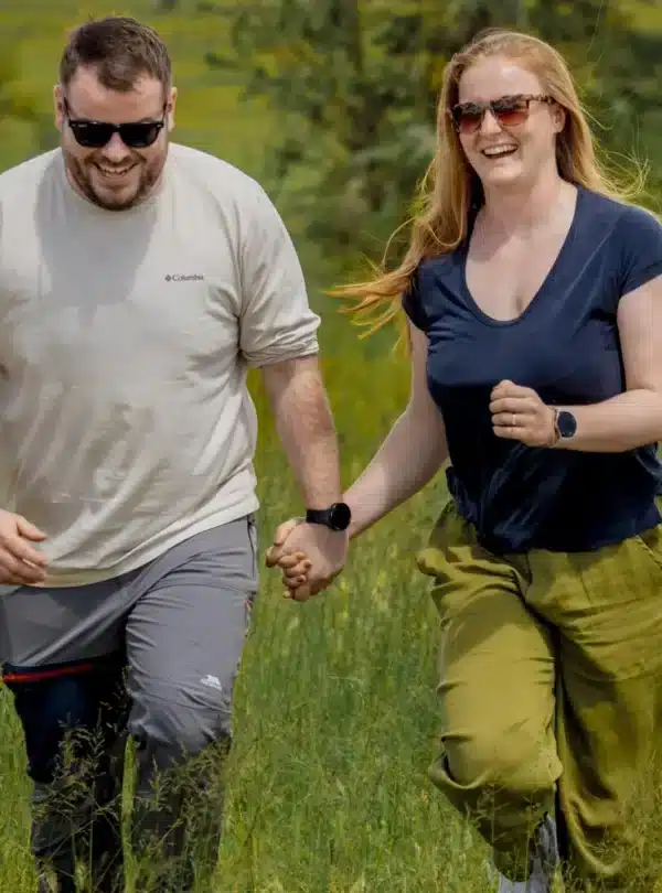 Couple enjoying a walking safari experience during an East Africa honeymoon safari