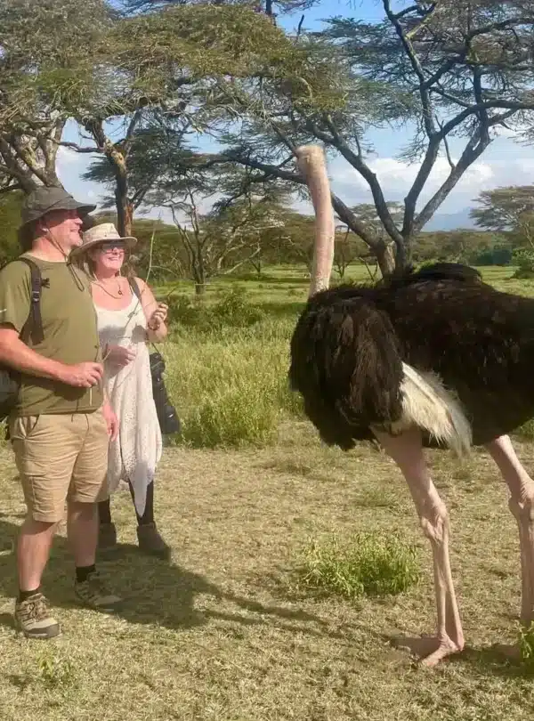 Couple enjoying a walking safari at Crescent Island near Lake Naivasha in Kenya