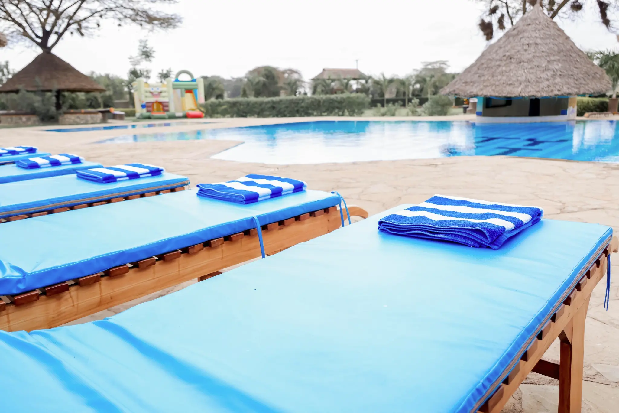 Swimming pool and sun loungers at Penety Amboseli Resort near Amboseli National Park