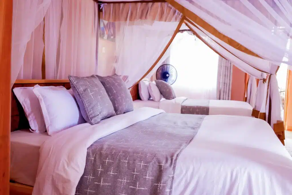 Twin room interior at Penety Amboseli Resort with canopy mosquito netting